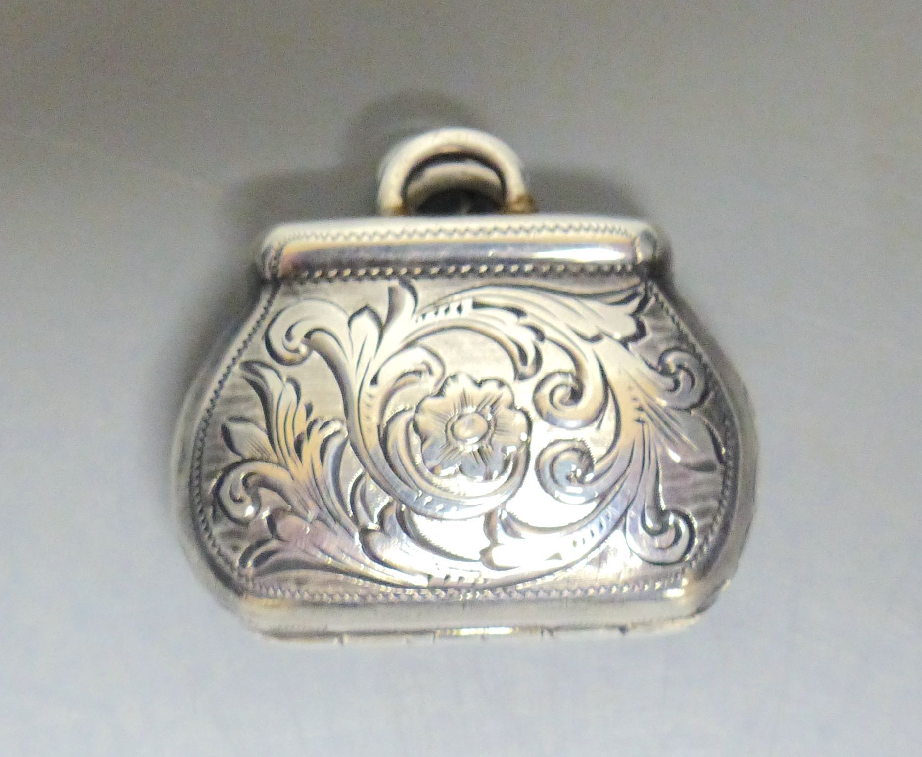 A Victorian novelty silver vinaigrette, modelled as a handbag, Joseph Wilmore, Birmingham, 1841, 28mm,